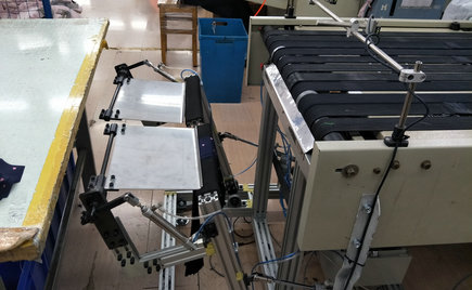 自動收料裝置在服裝加工粘襯技術(shù)中的應(yīng)用