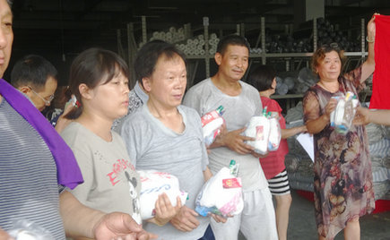 劉潭服裝：火烤的天氣 但員工的心頭很清涼