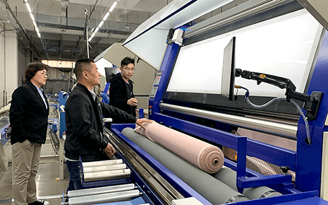 AI面料視覺熒光檢測設(shè)備助力劉潭服裝智能升級