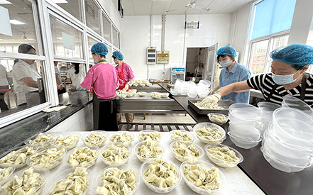 夏至餛飩飄香，劉潭服裝溫情暖人心